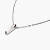 Silver necklace with a rectangular pendant on a white background