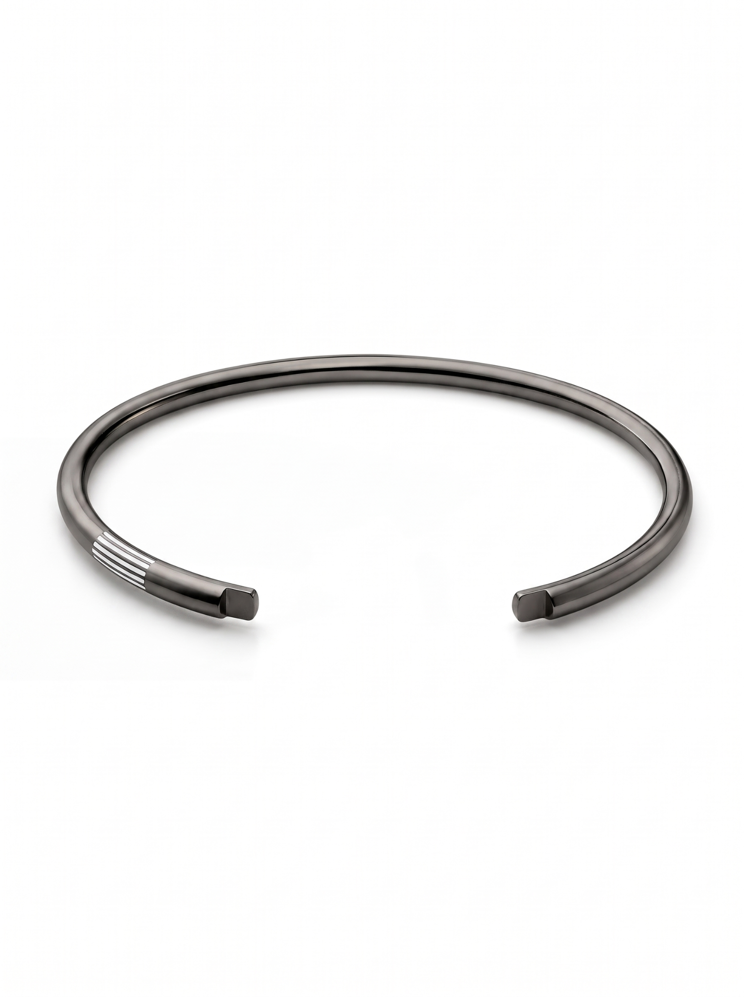 Black rhodium open cuff with parallel white enamel groove details near one end.