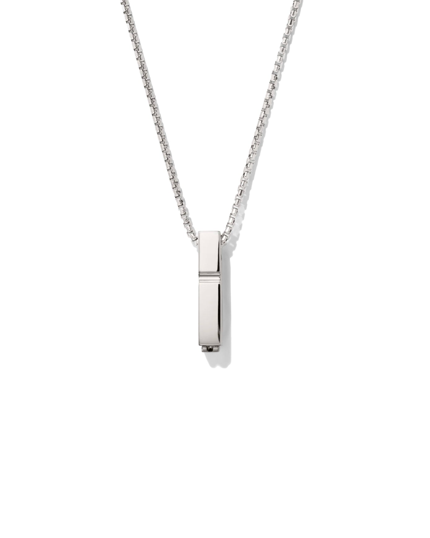 Silver necklace with a rectangular pendant on a white background